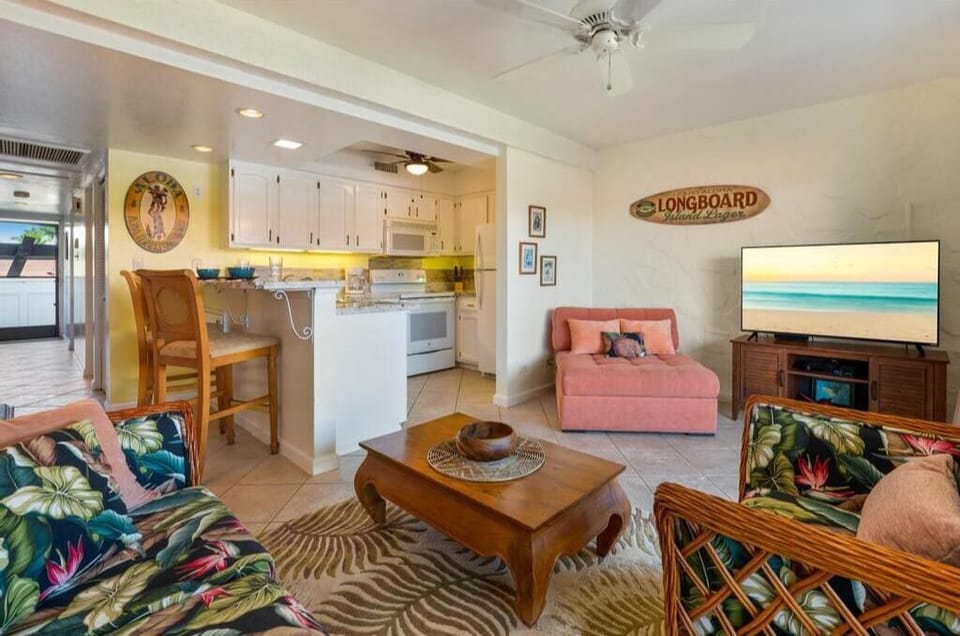 Kick back in this cozy, tropical-inspired living room—perfect for unwinding after a day of adventure