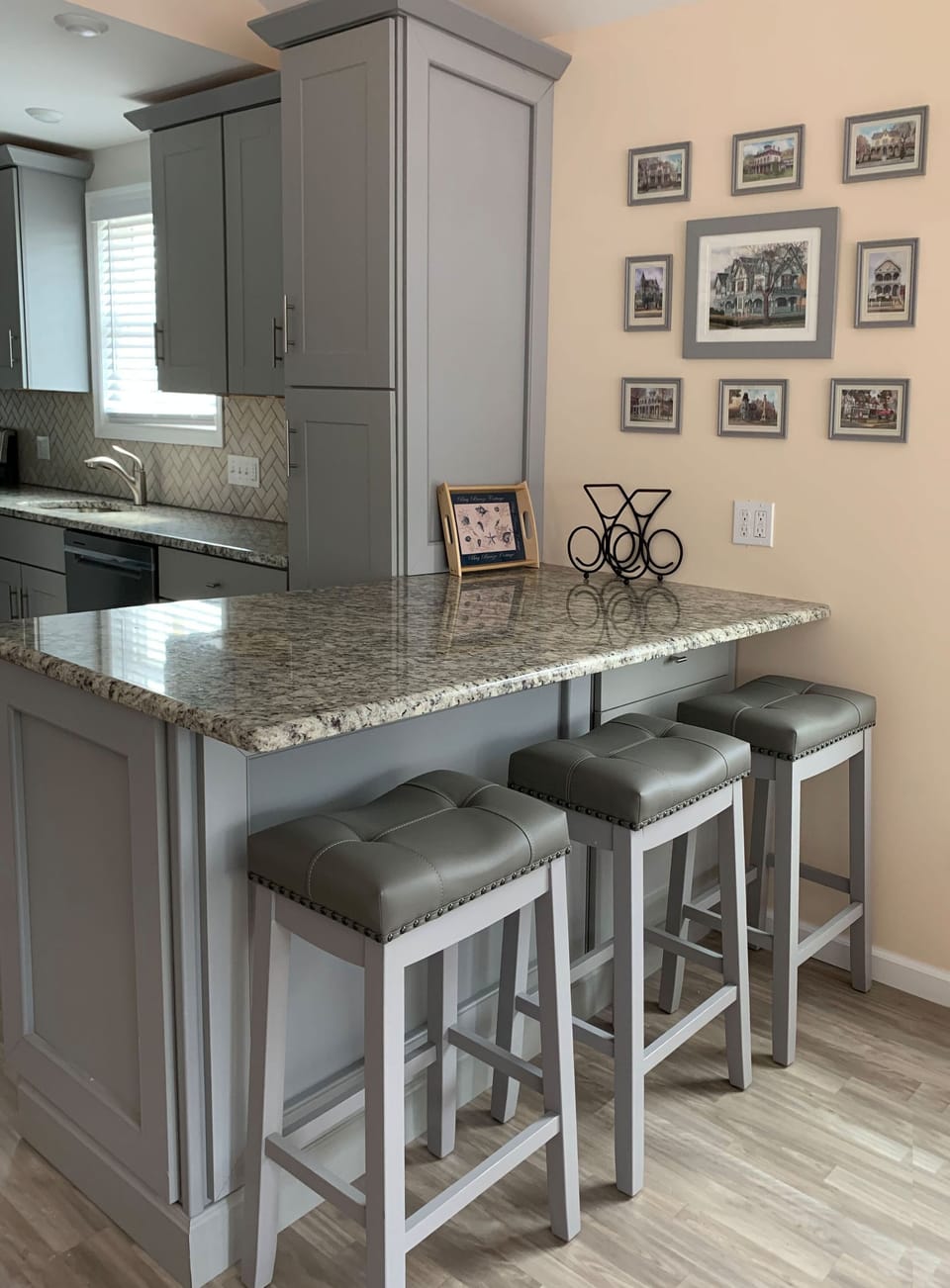 Hang out at the counter with your glass of wine while keeping the chef company!