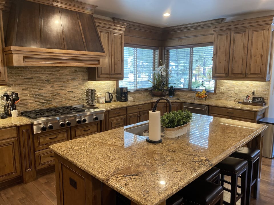 Gourmet kitchen with 6 burner stove, double ovens and 2 dishwashers. 