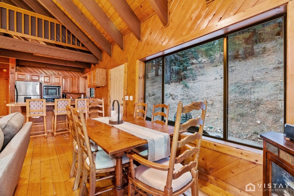 Dining table seats up to 8 with leafs put in plus 3 more at the counter
