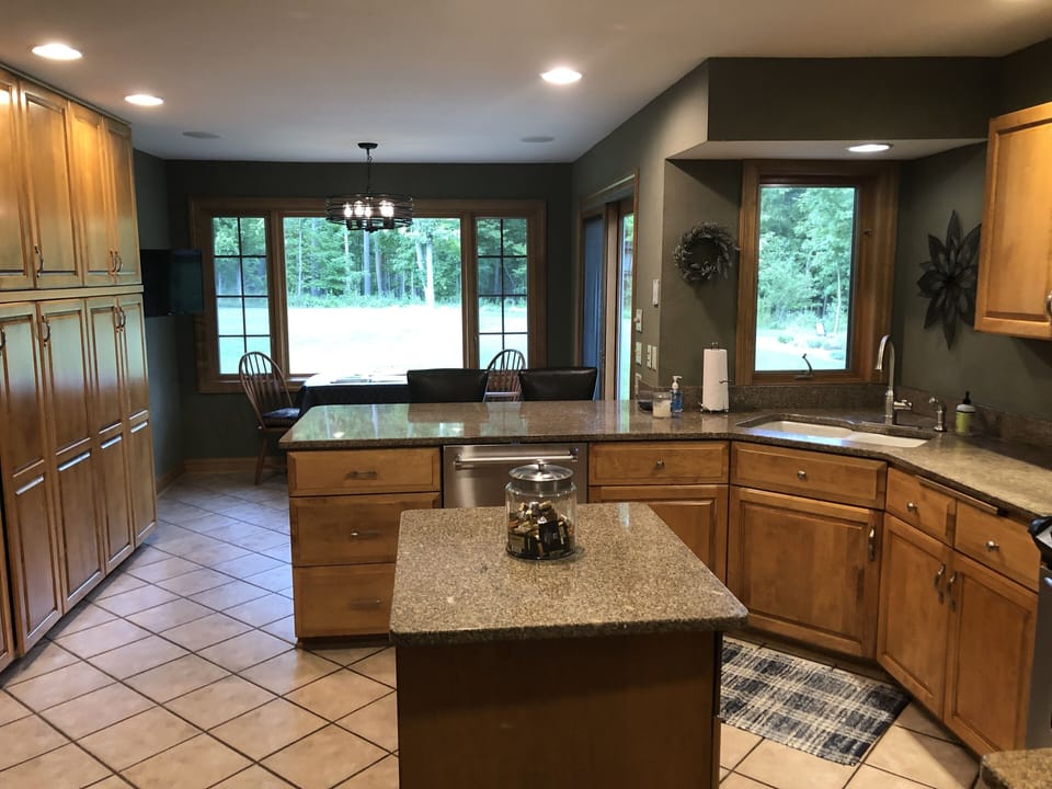 Kitchen also features seating for four and TV monitor