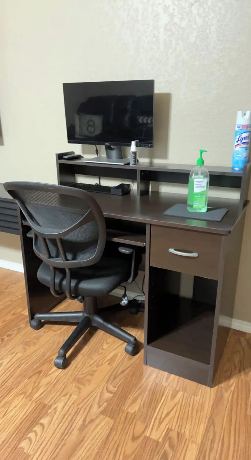 Dedicated workstation with a large monitor and comfortable chair.