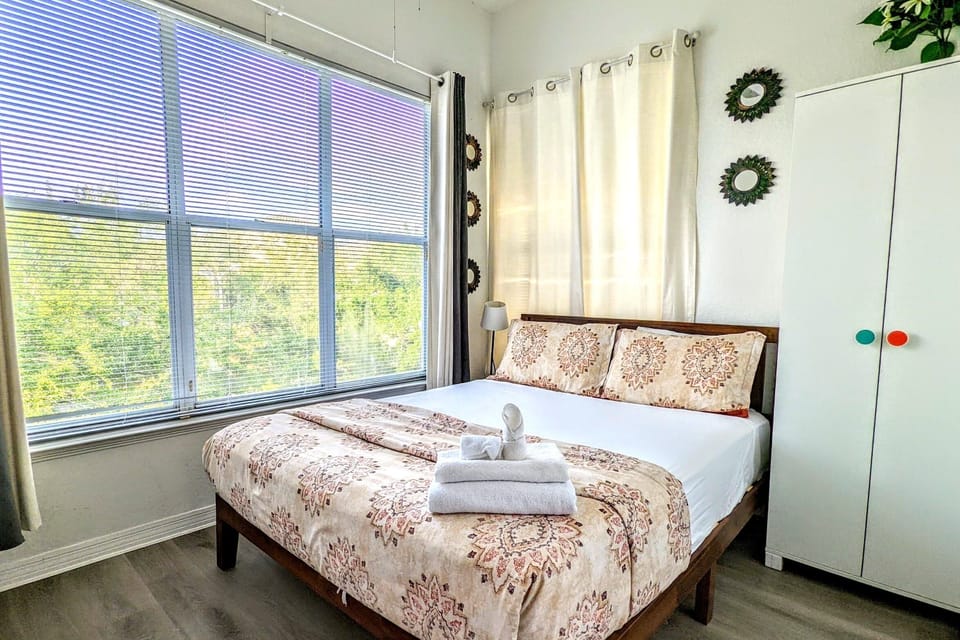 Small and Compact Guest Bedroom with Queen Bed.