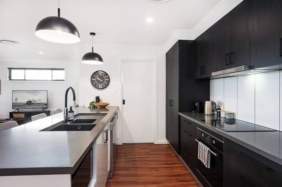 A contemporary kitchen has all the appliances, utensils and equipment you need to enjoy cooking when taking a rest from the great restaurants around you.
