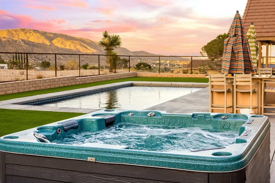 Soak up in our 6-person hot tub with bluetooth speaker installed.