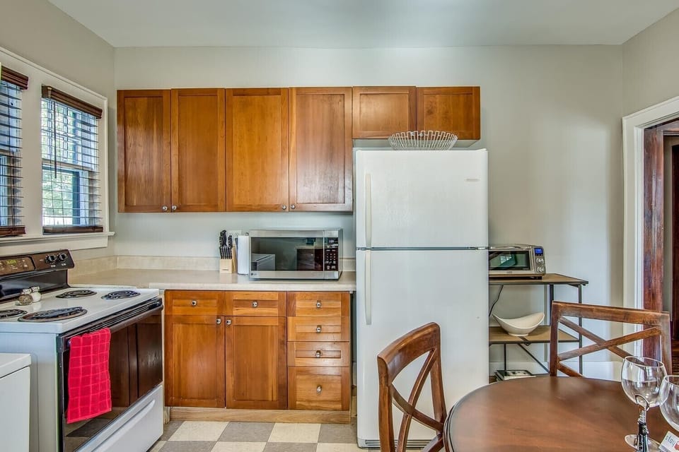 Kitchen includes basic pantry items like coffee essentials and papergoods