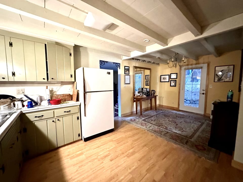 Kitchen; mudroom behind fridge has + servingware