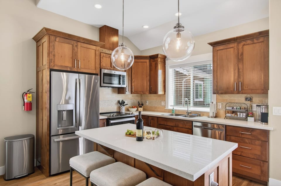 The large center island offers additional space for seating and meal prep.