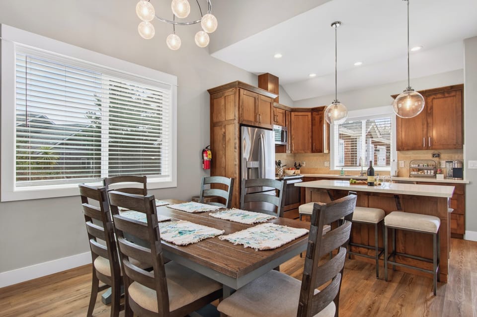 Our modern kitchen layout flows seamlessly into the dining and living areas.