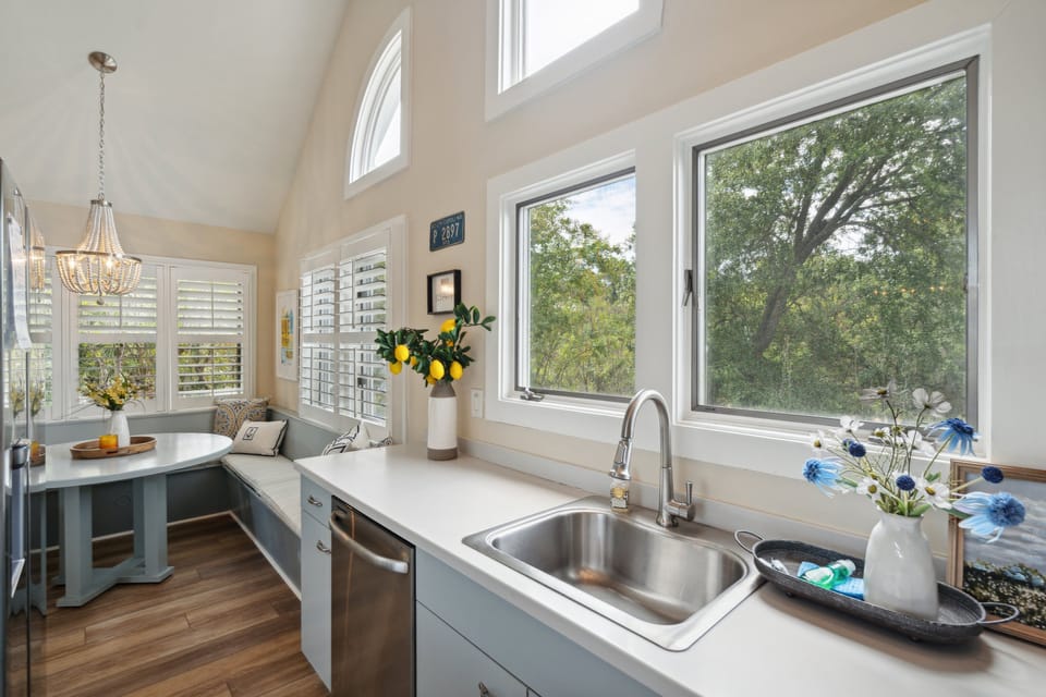 The breakfast table opens onto the kitchen