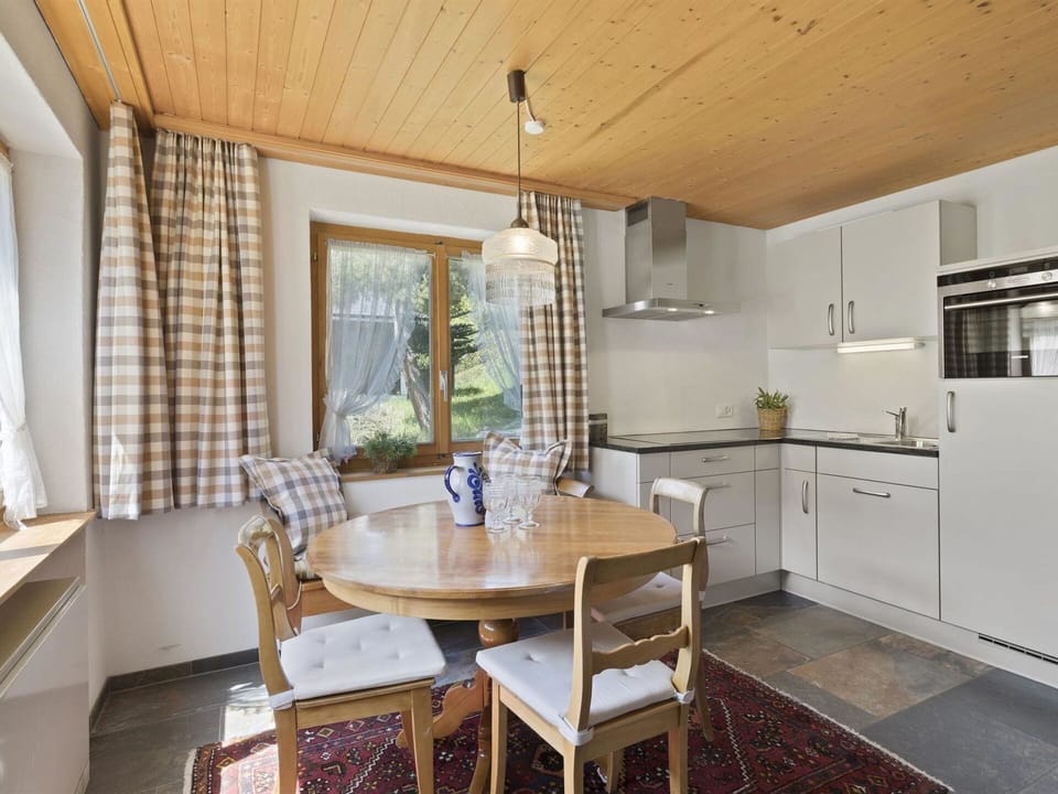 Property, Furniture, Cabinetry, Table, Countertop, Chair, Wood, Couch, Kitchen Appliance, Curtain