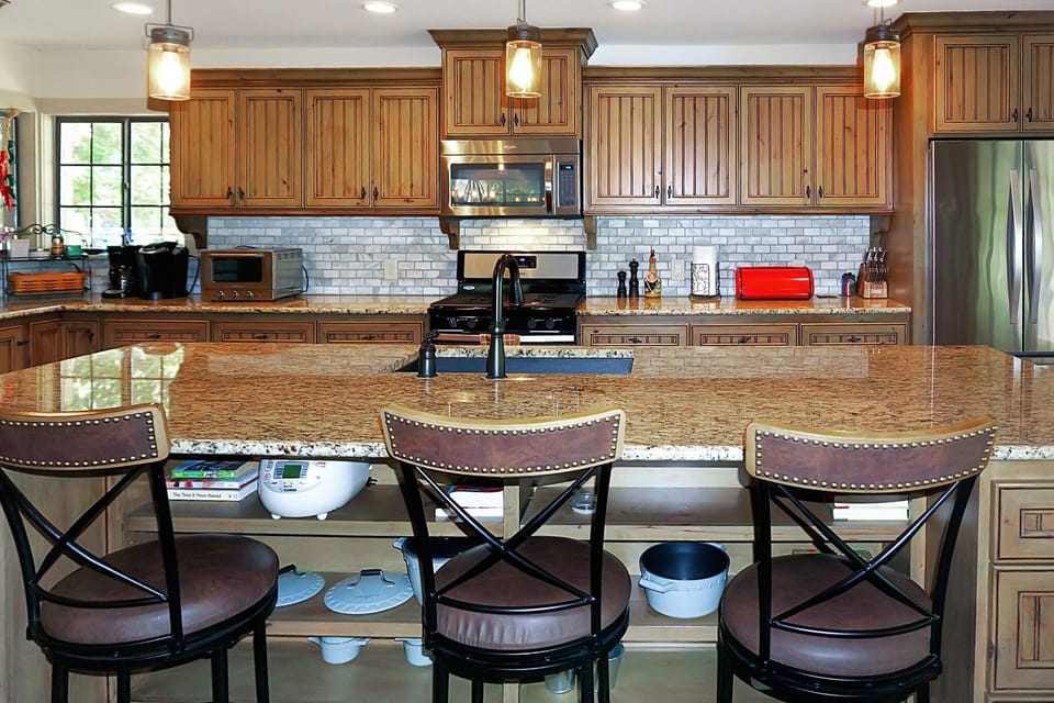 Bar seating with three guests