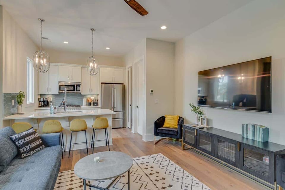 Relax in the expansive living room, complete with a queen sleeper sofa for added convenience.