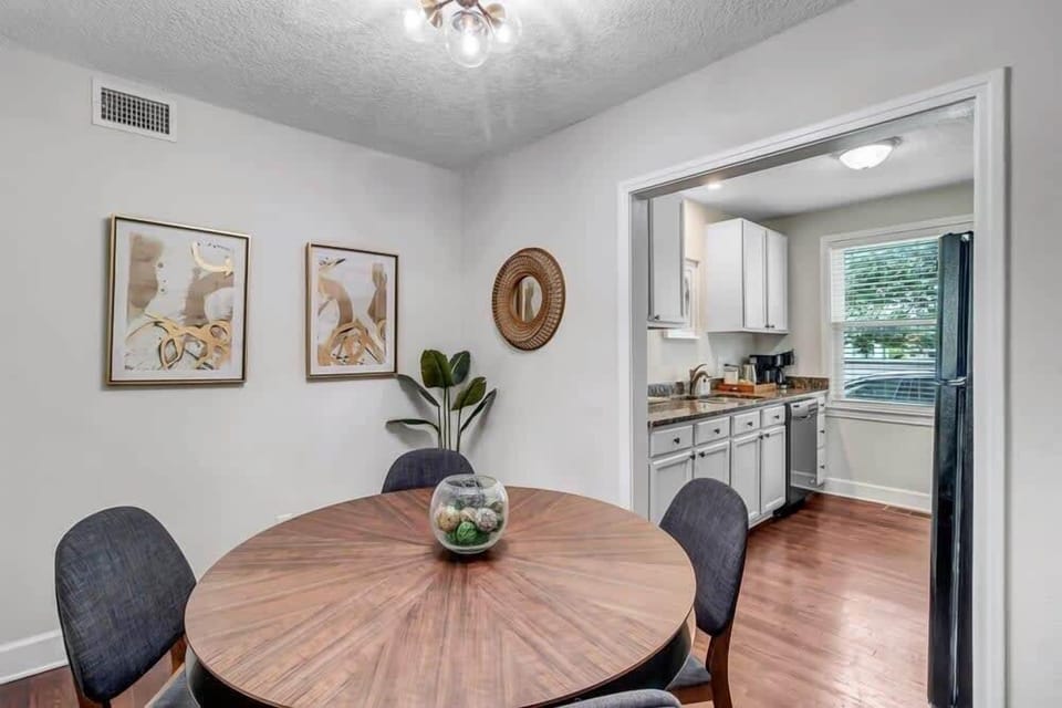 Separate dining space with space for gathering for meals or games.