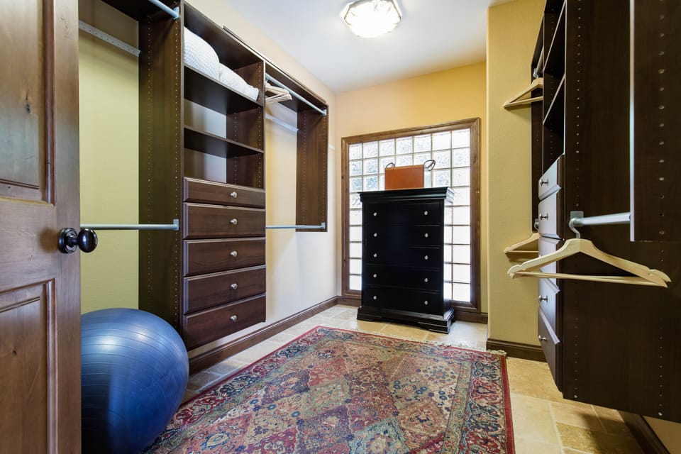 The Primary King Suite features luxury bedding, a private patio with seating, 50" TV, and a huge Spa-like En Suite Bathroom.