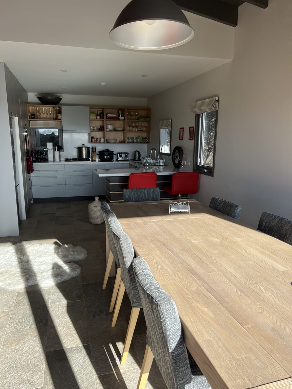 Full kitchen and dining table to seat 8