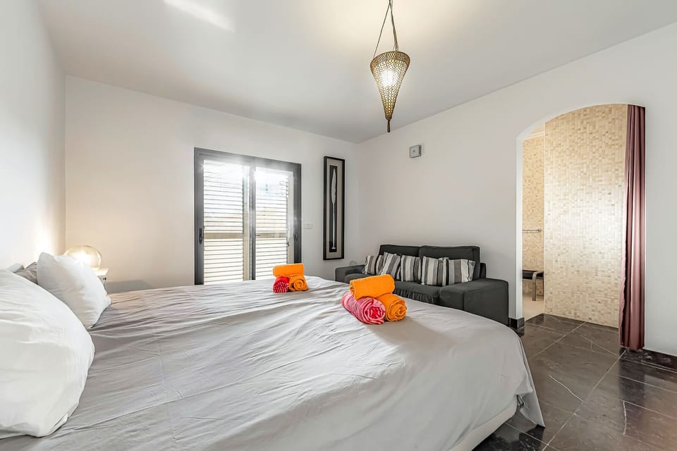 First bedroom with en-suite bathroom on the lower floor
