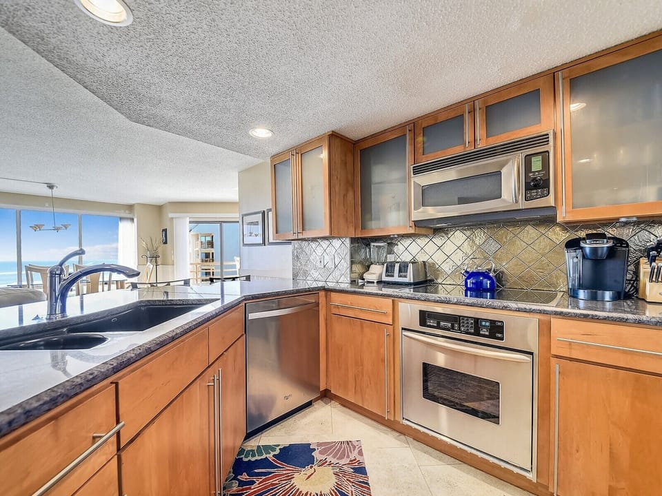 Kitchen with Stainless Steel Appliances at 1402 Villamare