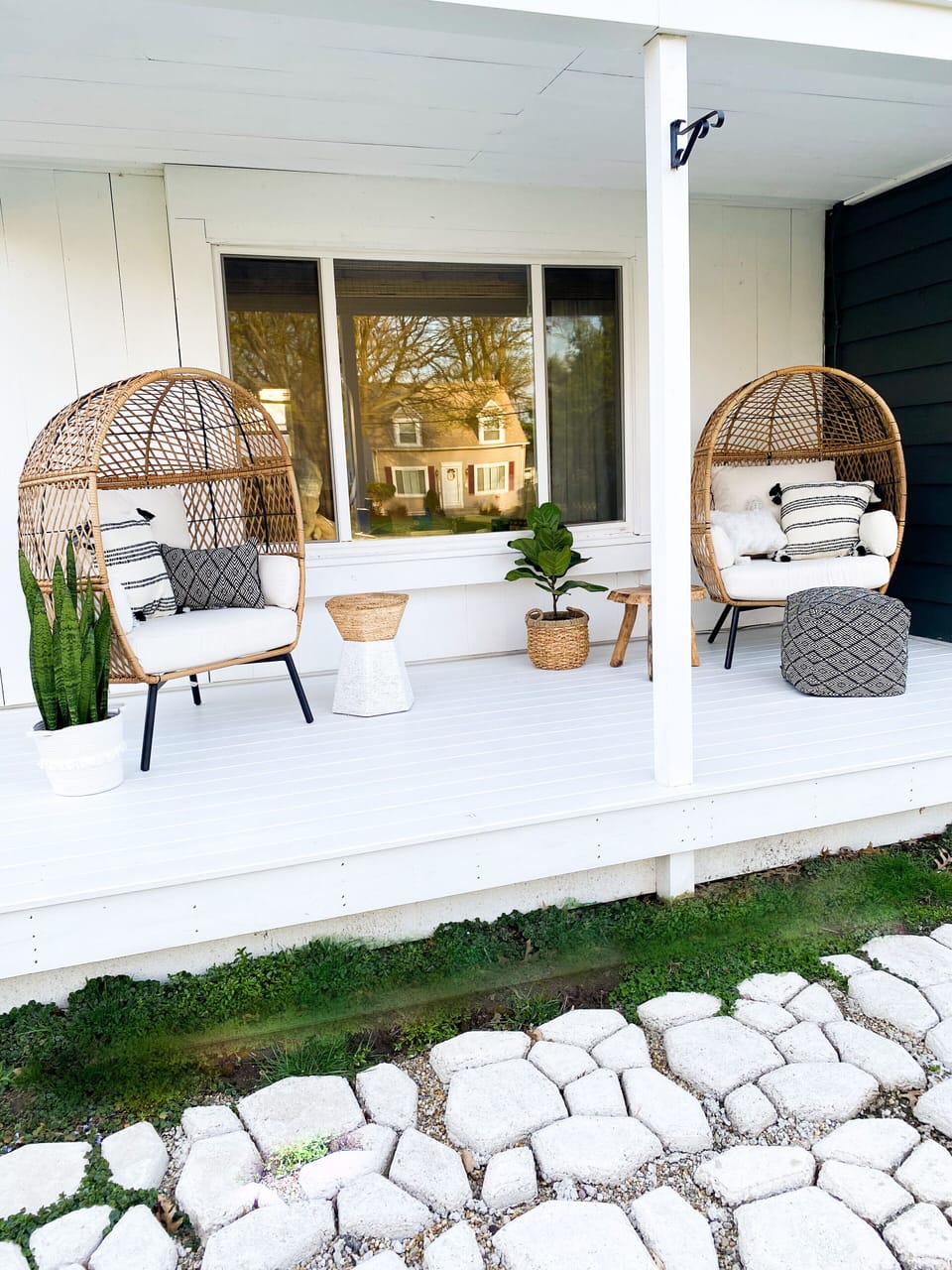 Two large cozy egg chairs, perfect for getting comfortable with a good book!