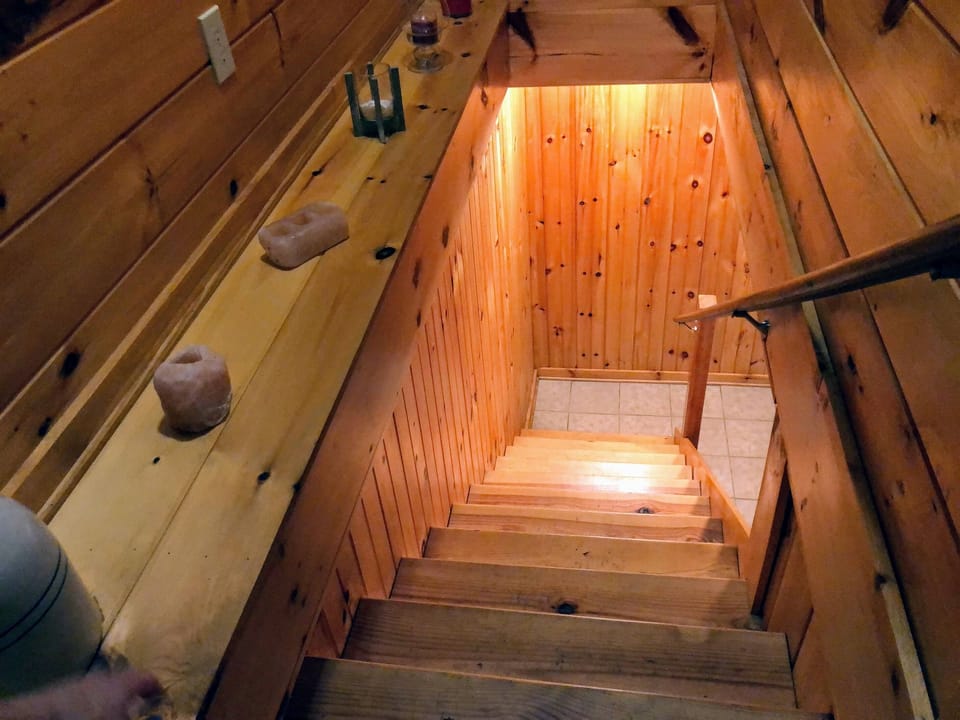 Stairs leading to bedroom and bathroom