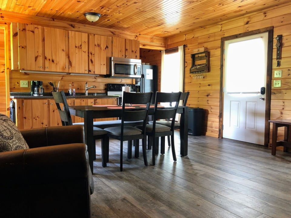 Dining table seating for 6 and kitchen area