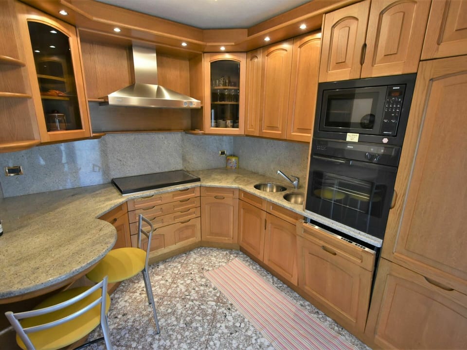 Cabinetry, Furniture, Property, Countertop, Kitchen, Wood, Chair, Lighting, Interior Design, Drawer