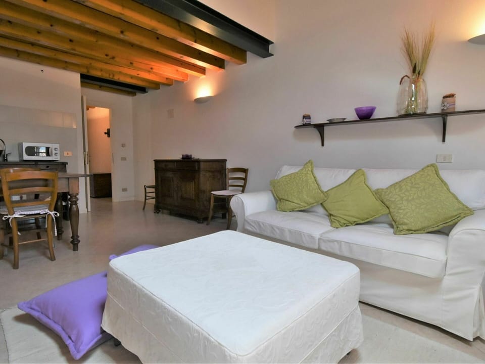 Furniture, Property, Table, Comfort, Building, Couch, Wood, Floor, Interior Design, Pillow