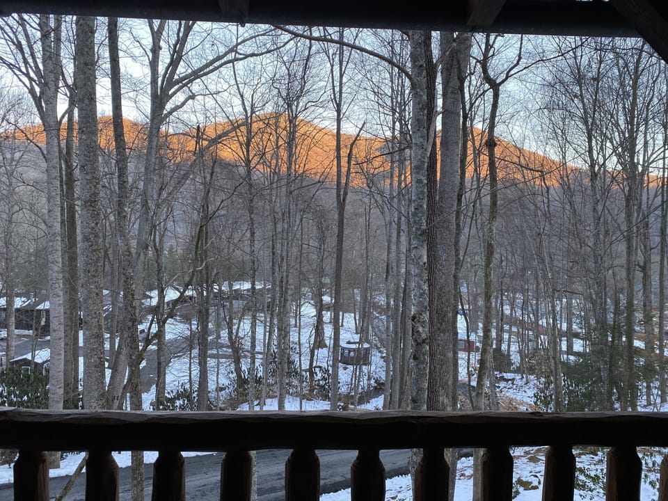 Enjoy morning coffee with this seasonal view of the mountain across the valley