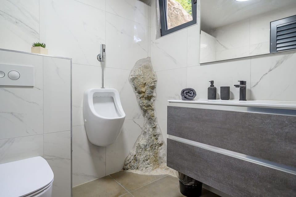 Guest toilet  in the basement of the Split luxury villa with heated pool
