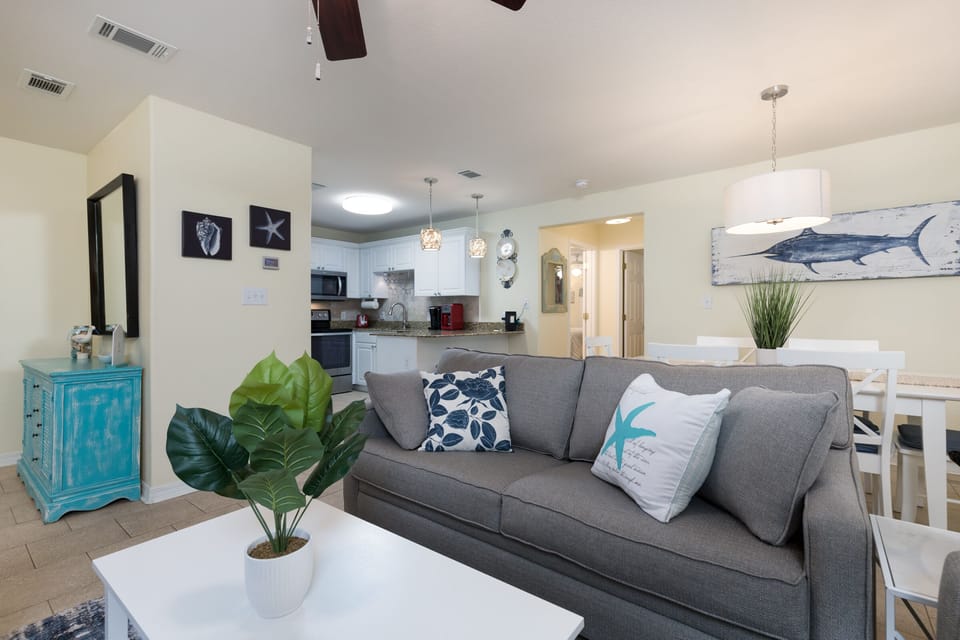 Open floor plan living, dining, and kitchen