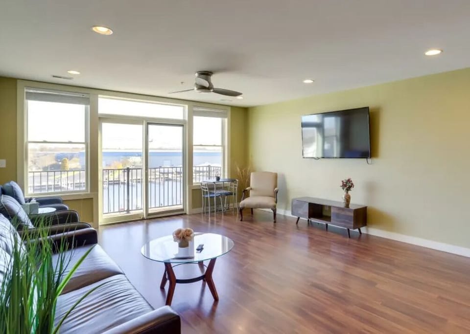 Spacious Living Room Overlooking Water and Boats