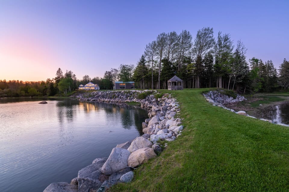 View from the point back towards the gazebo and house at dusk
