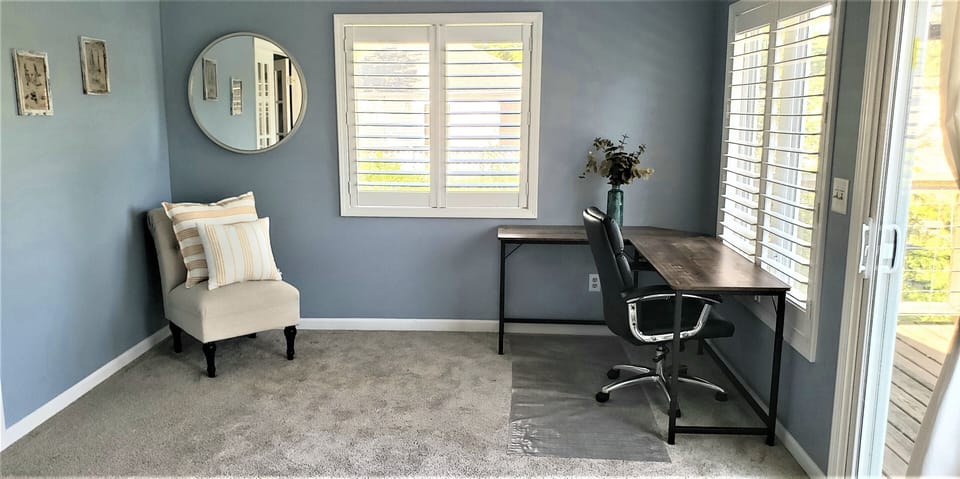 Desk and chair ready to go with views of the Lake 