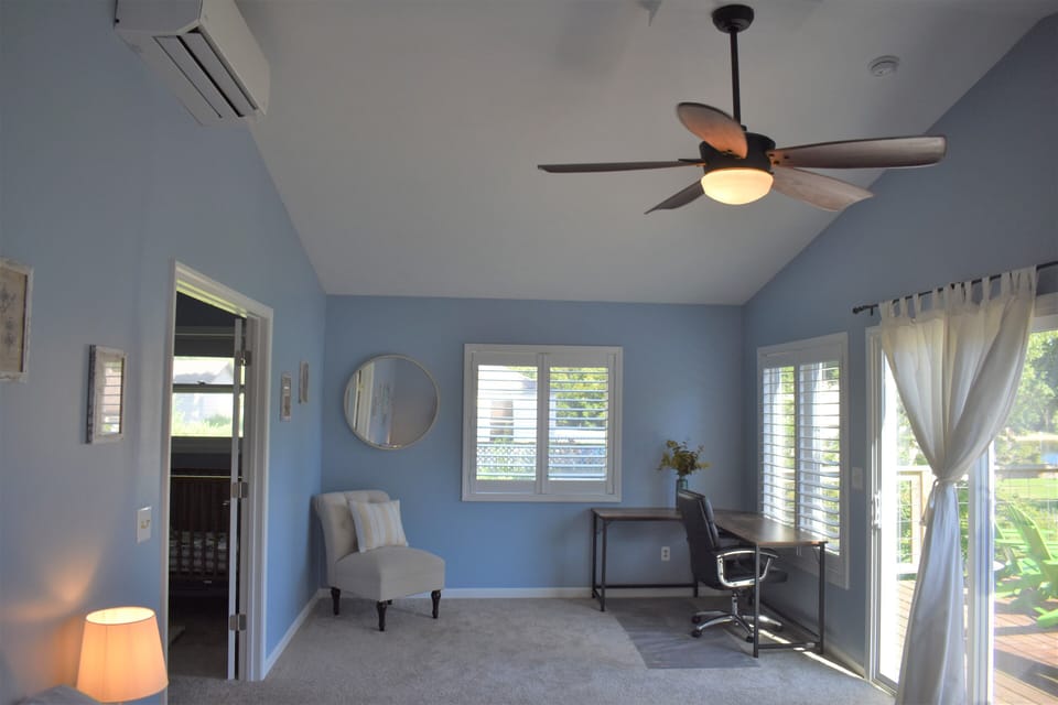 Master Bedroom office space with views of the lake and access to the deck