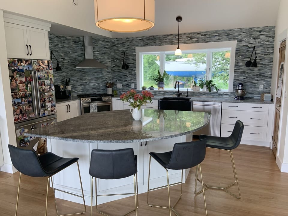 The granite island and kitchen.