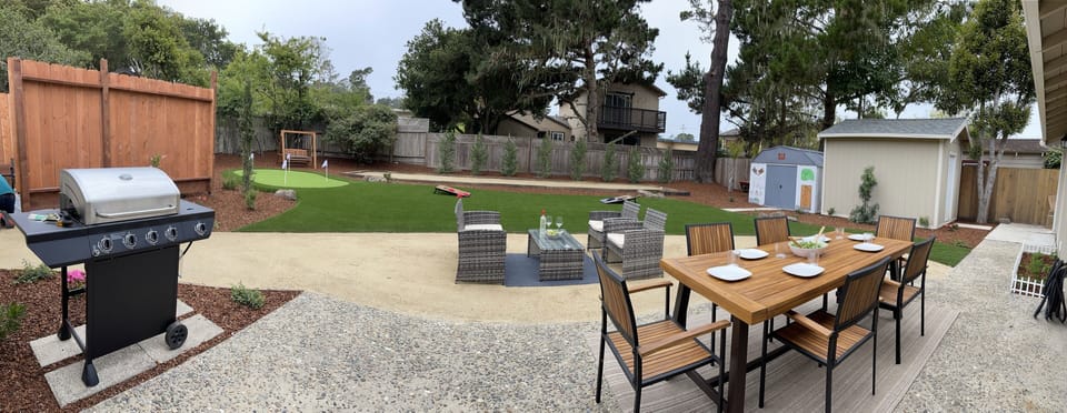 Backyard (with BBQ Grill, plenty of seating, putting green, and bocce ball)