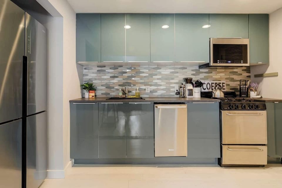 Fully stocked kitchen with high-end appliances.