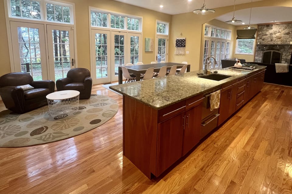 Kitchen and living room overlooking Wing Pond