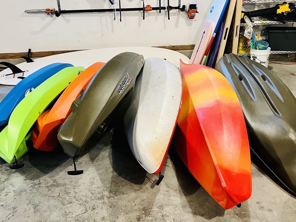 7 Kayaks 3 kid/4adult, Paddle Board, will be down at pond.