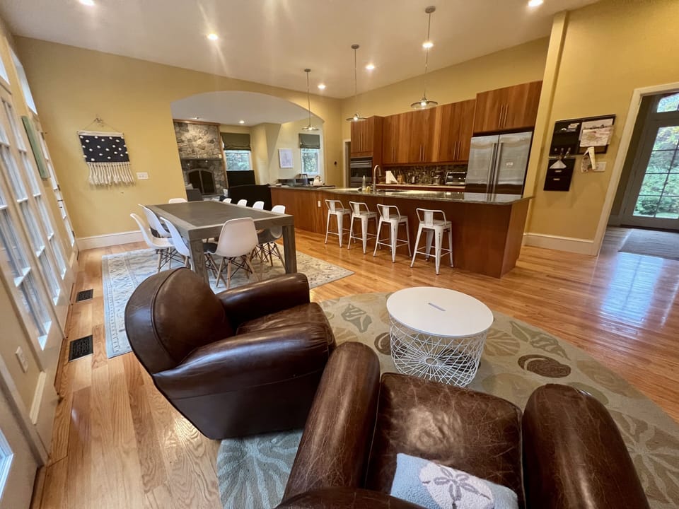 Kitchen with sitting area, 16 foot island and RH table.
