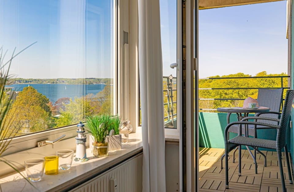 spacious, bright living area with access to the balcony