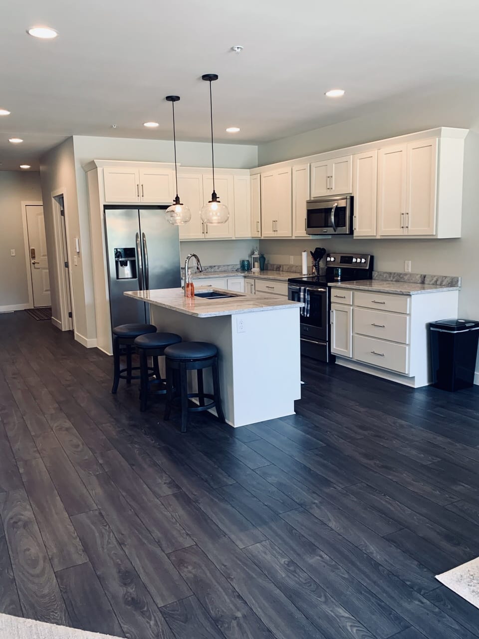 Large, updated, & fully furnished kitchen.