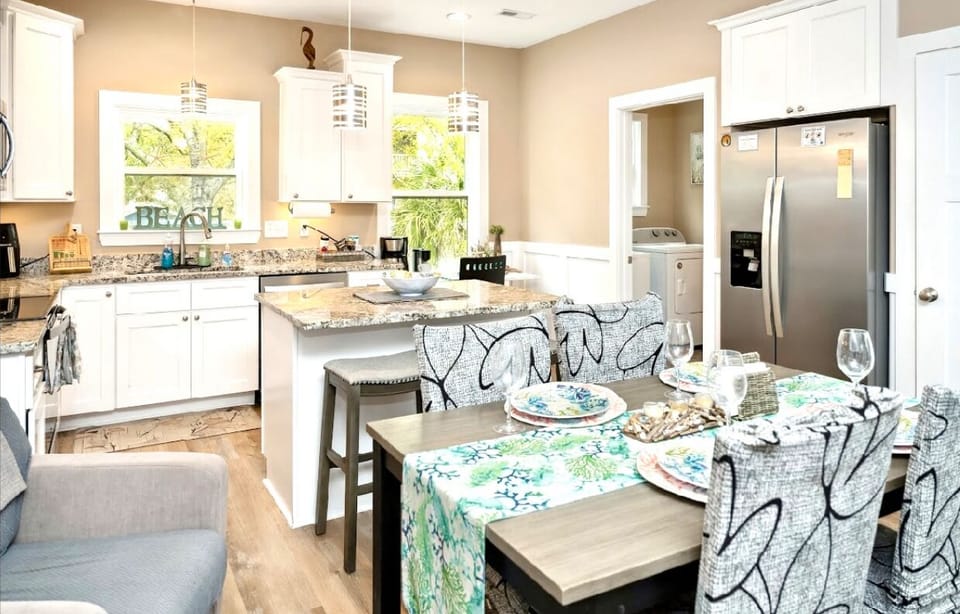 Dining table with arm chair, padded chairs and bench and 2 high chairs for 8-9 people 