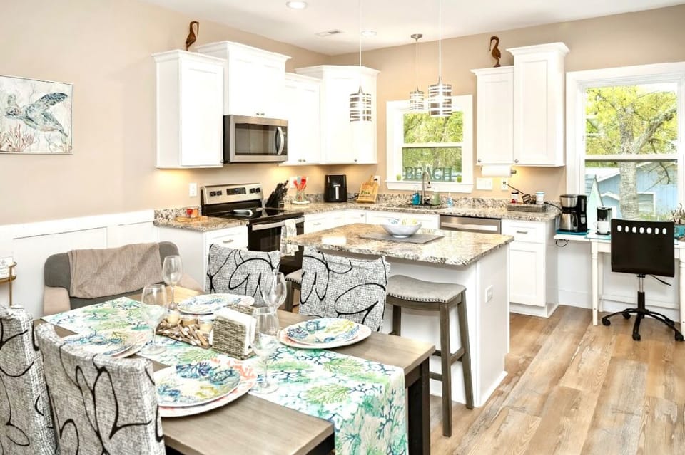 fully stocked  kitchen, office table with 