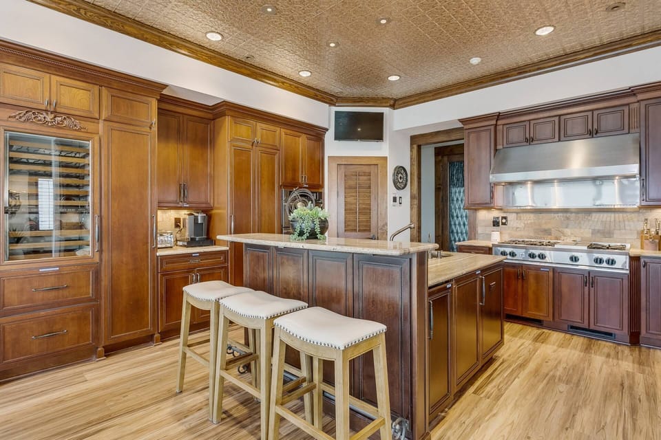 Built in sub zero refrigerator and freezer - 6 burner gas and hood range
