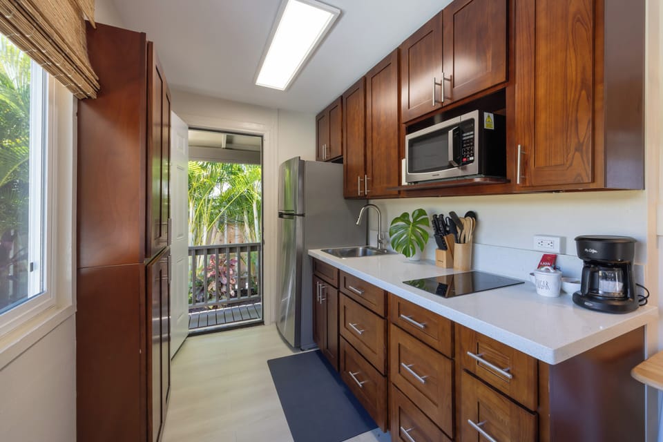 Back cottage is a 2 bedroom/ 1 bath unit with a fully stock kitchenette.