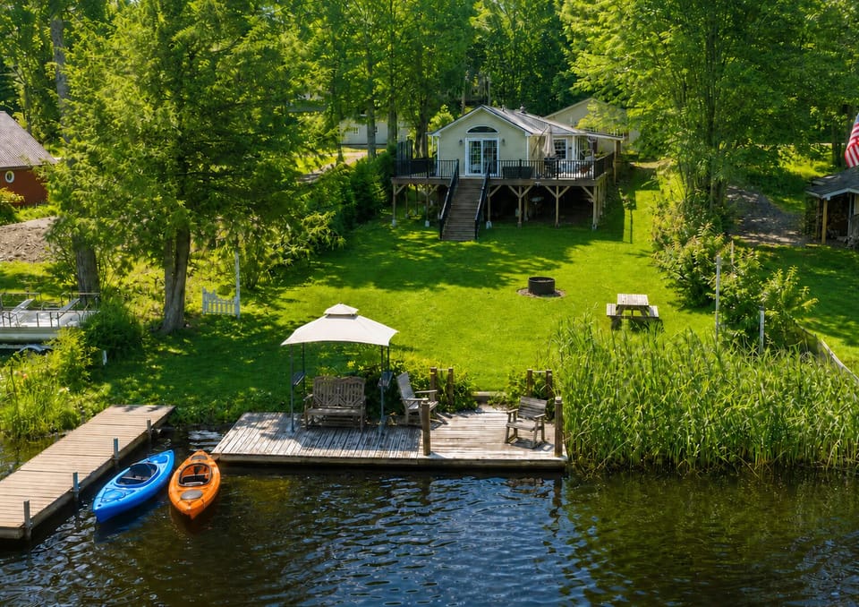 Bright mornings, calm waters, and kayaks—your perfect summer escape by the shore