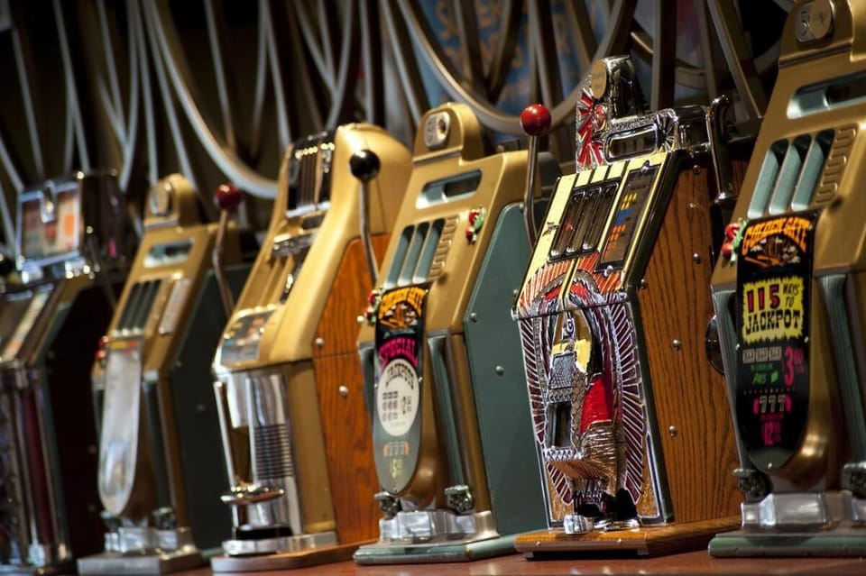 Try your luck with classic gaming machines and bright lights.