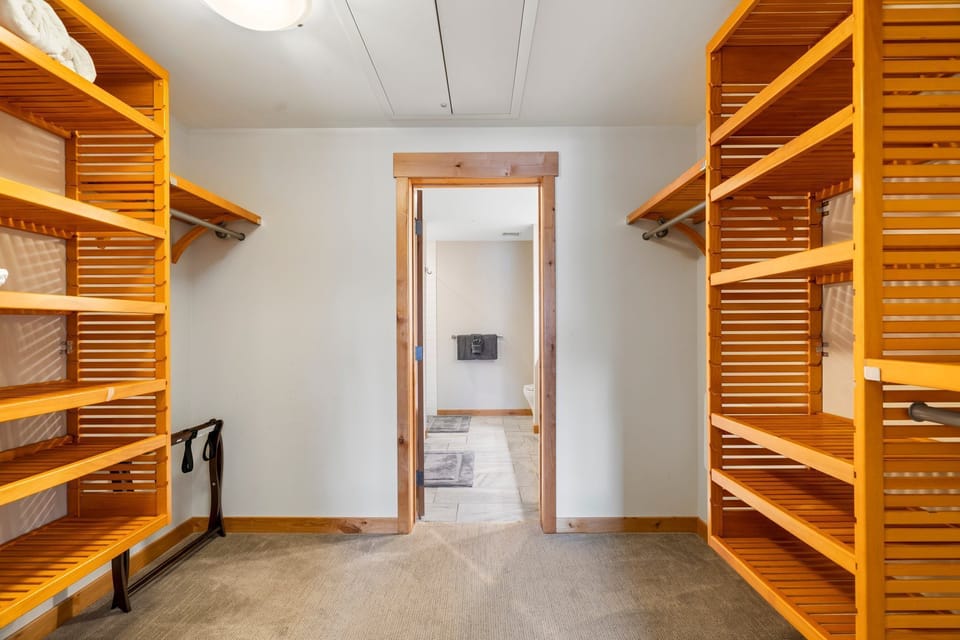 The master ensuite bathroom features a large closet.