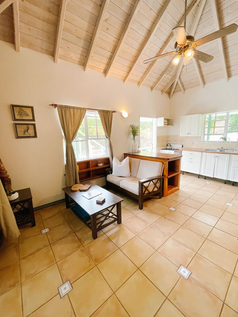 The indoor living space and kitchen.